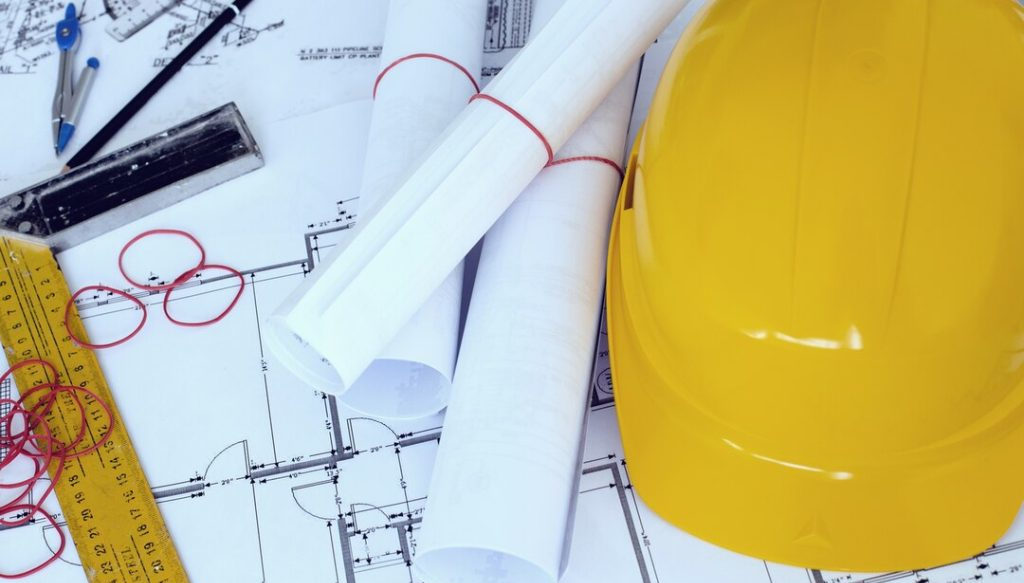 Caschetto e disegni tecnici